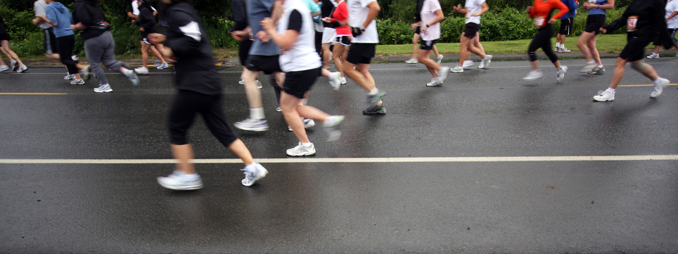 Runners legs at the start of a race.